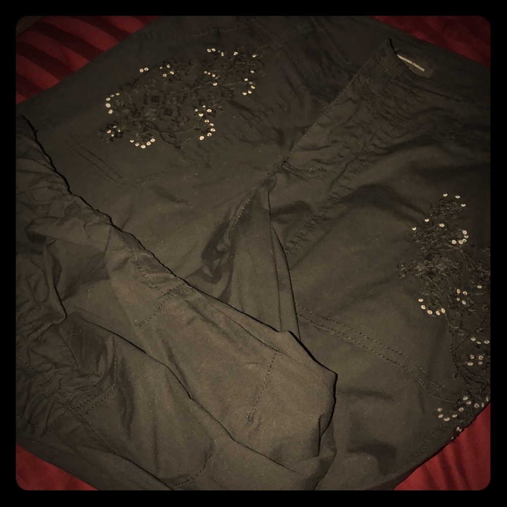 Inc scrunched pants with a litter bedazzled pocke